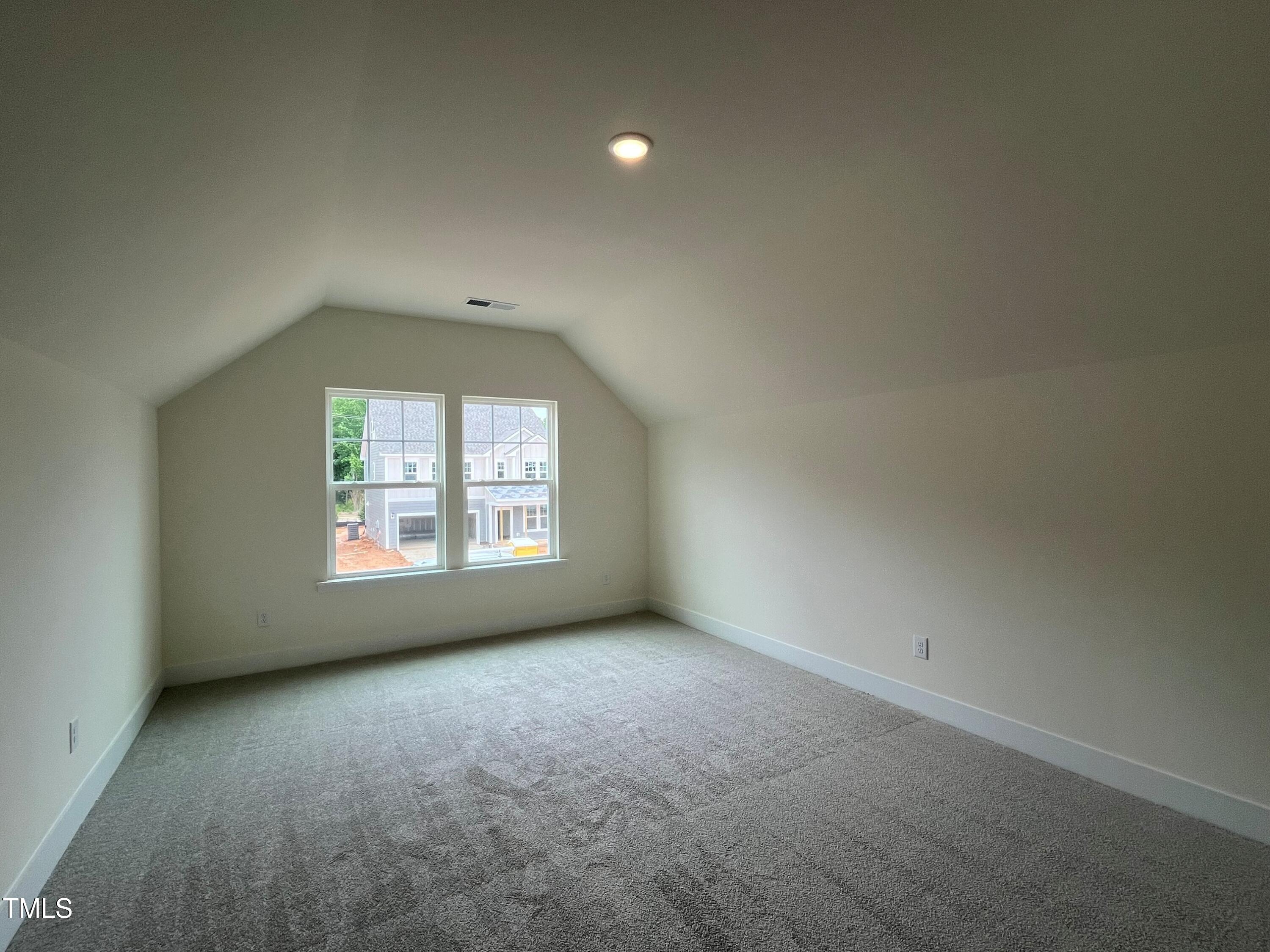 771 Old Station Pointe Angier, NC 27501 - Photo 20 of 35 an empty room with a window