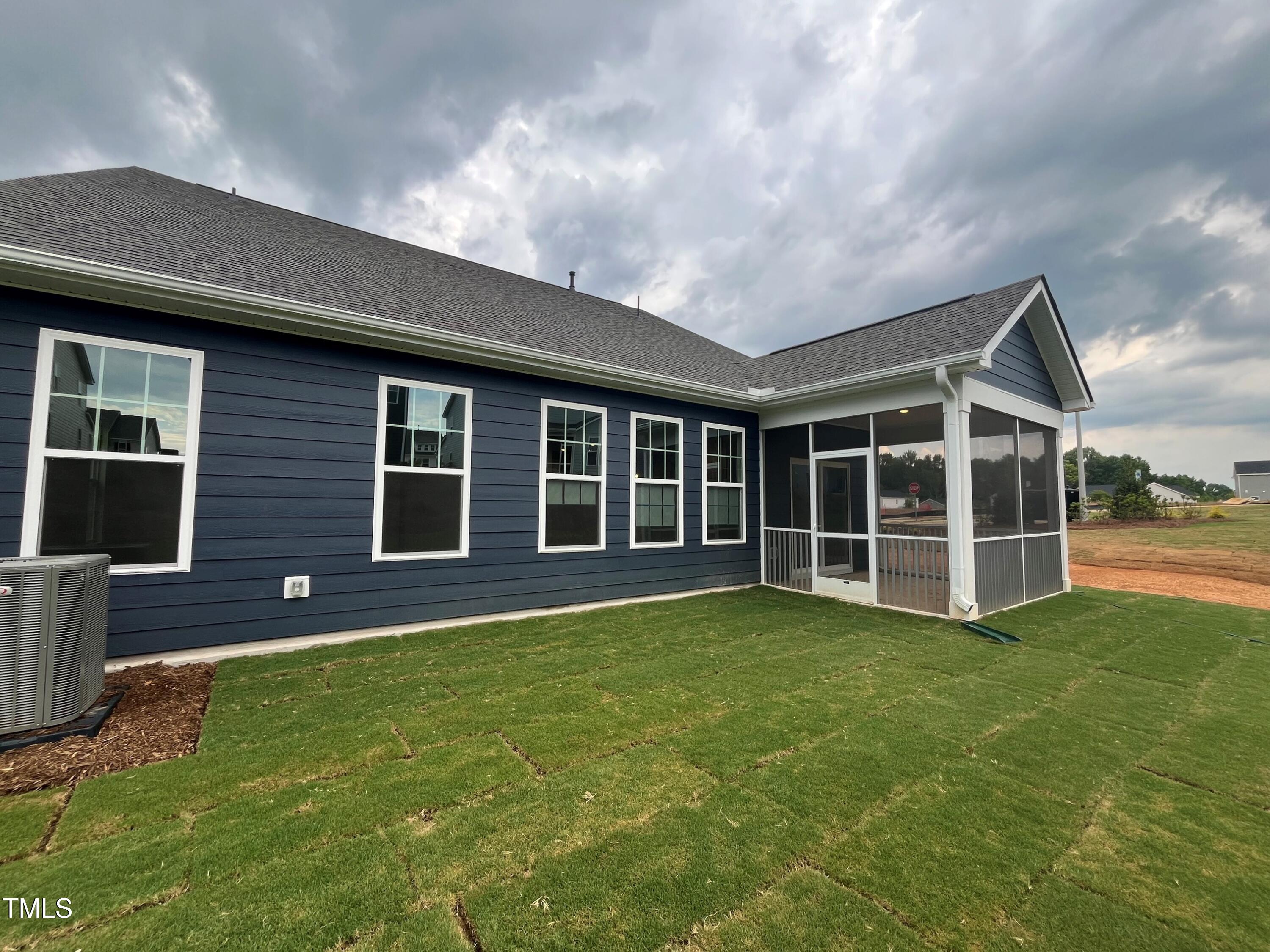 771 Old Station Pointe Angier, NC 27501 - Photo 2 of 35 a view of a house with a yard