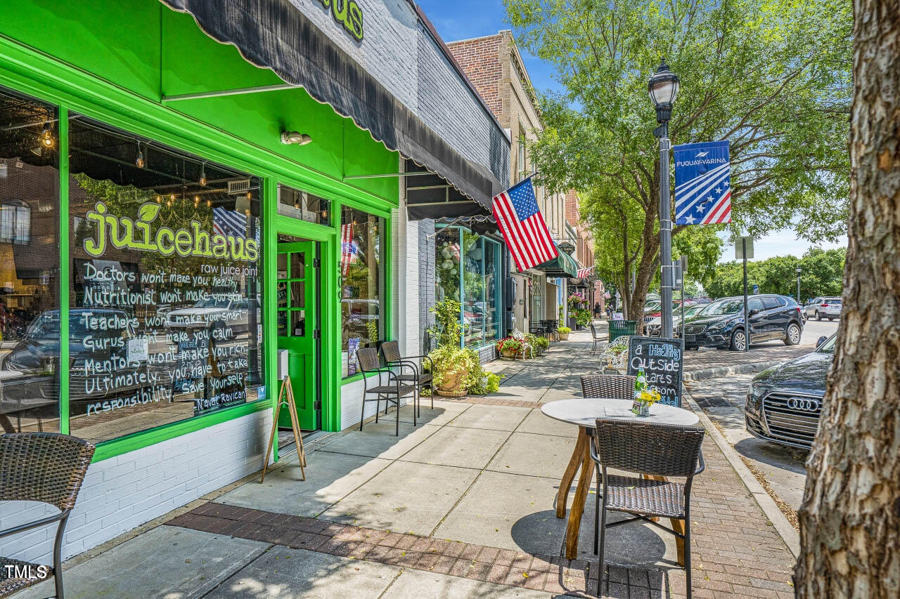 771 Old Station Pointe Angier, NC 27501 - Photo 33 of 35 a view of a patio with table and chairs and potted plants