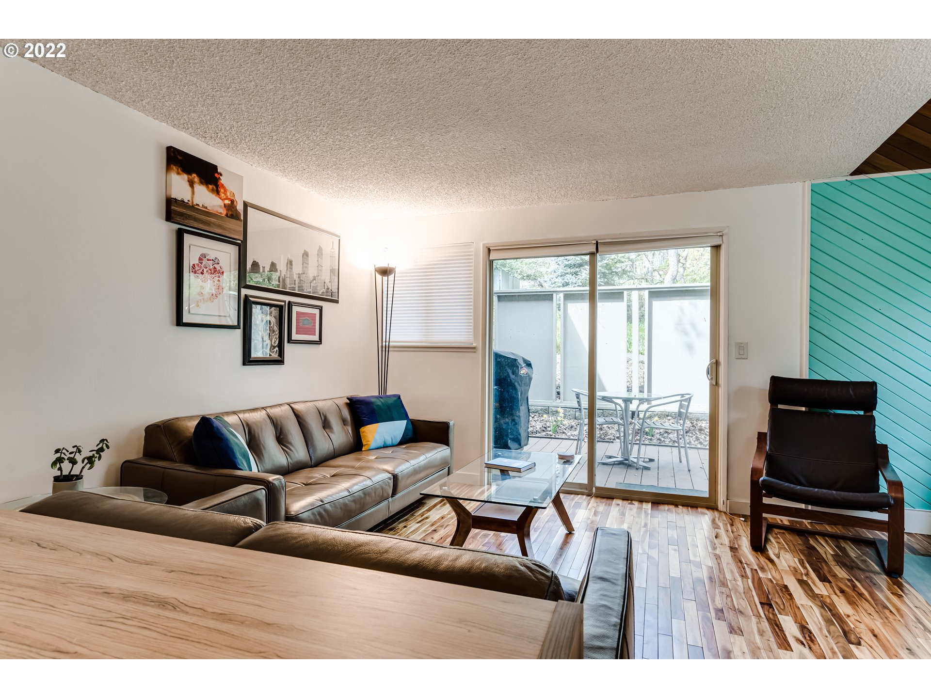 4433 Fox Hollow Road, Unit 1 Eugene, OR 97405 - Photo 12 of 30 a living room with furniture and a flat screen tv