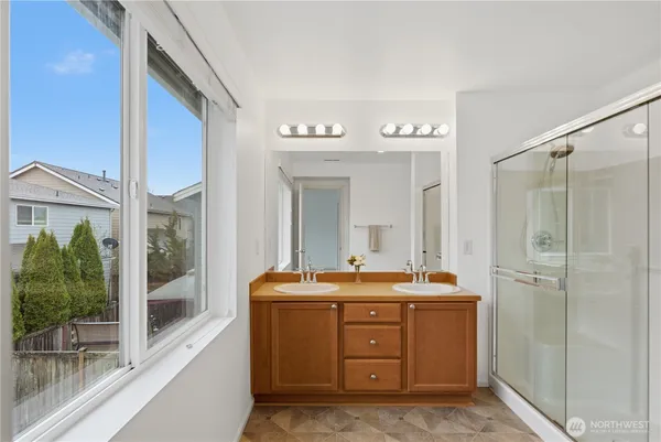 a room with a sink and a mirror