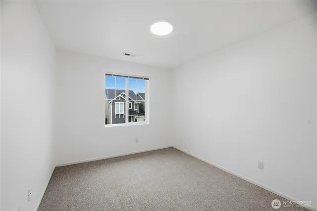 a view of an empty room with window