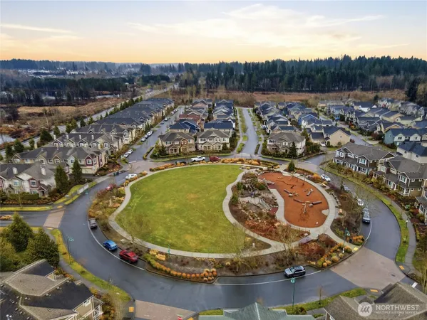 an aerial view of a house with outdoor space
