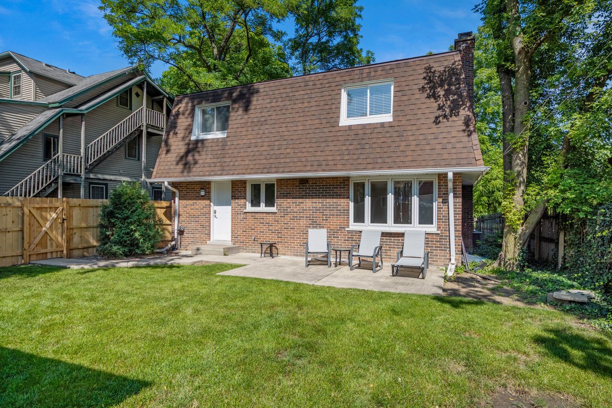 2500 Green Bay Road Highland Park, IL 60035 - Photo 16 of 18 a view of a house with a yard and sitting area