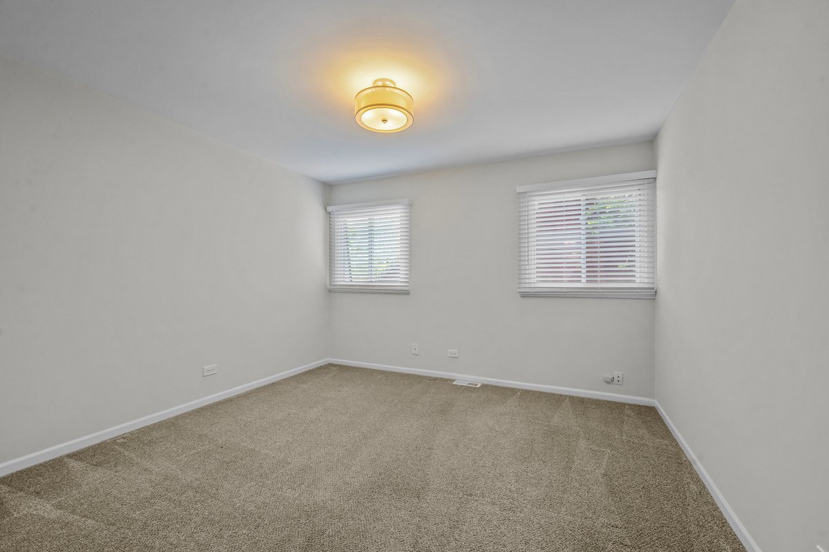 2500 Green Bay Road Highland Park, IL 60035 - Photo 10 of 18 an empty room with windows