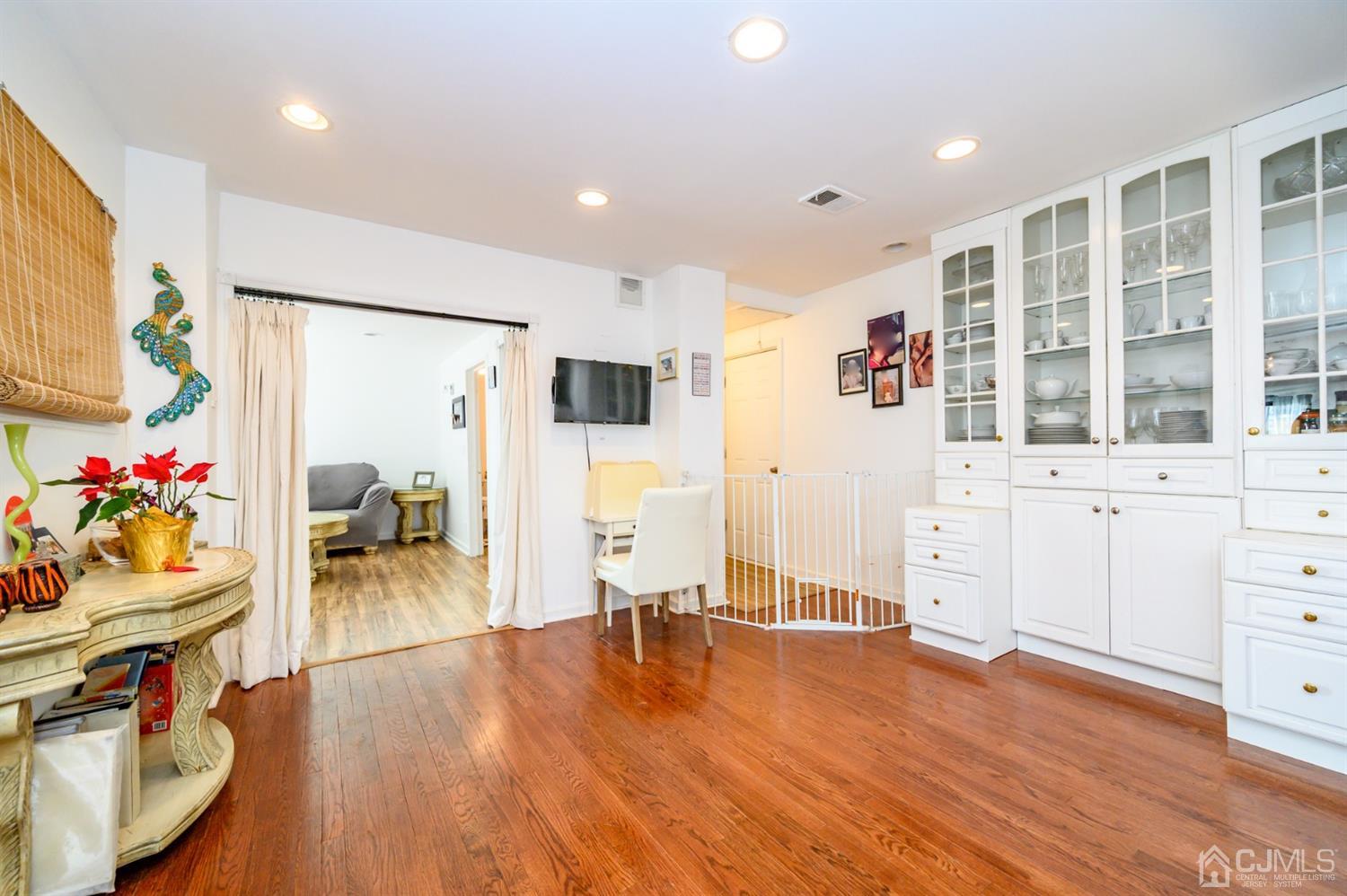 31 Parker Road Long Valley, NJ 07853 - Photo 12 of 46 a living room with furniture and a flat screen tv