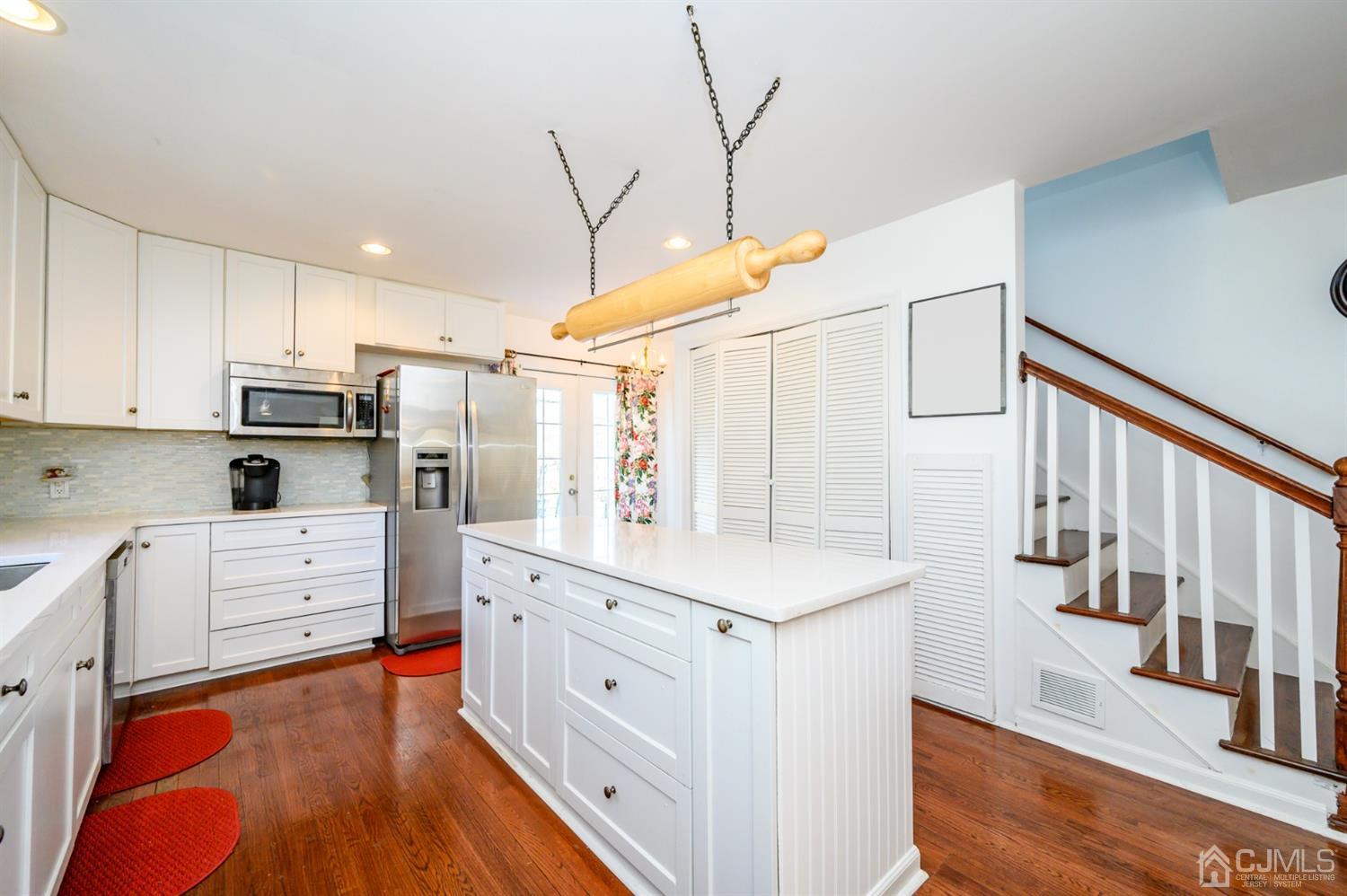 31 Parker Road Long Valley, NJ 07853 - Photo 20 of 46 a kitchen with white cabinets and white appliances