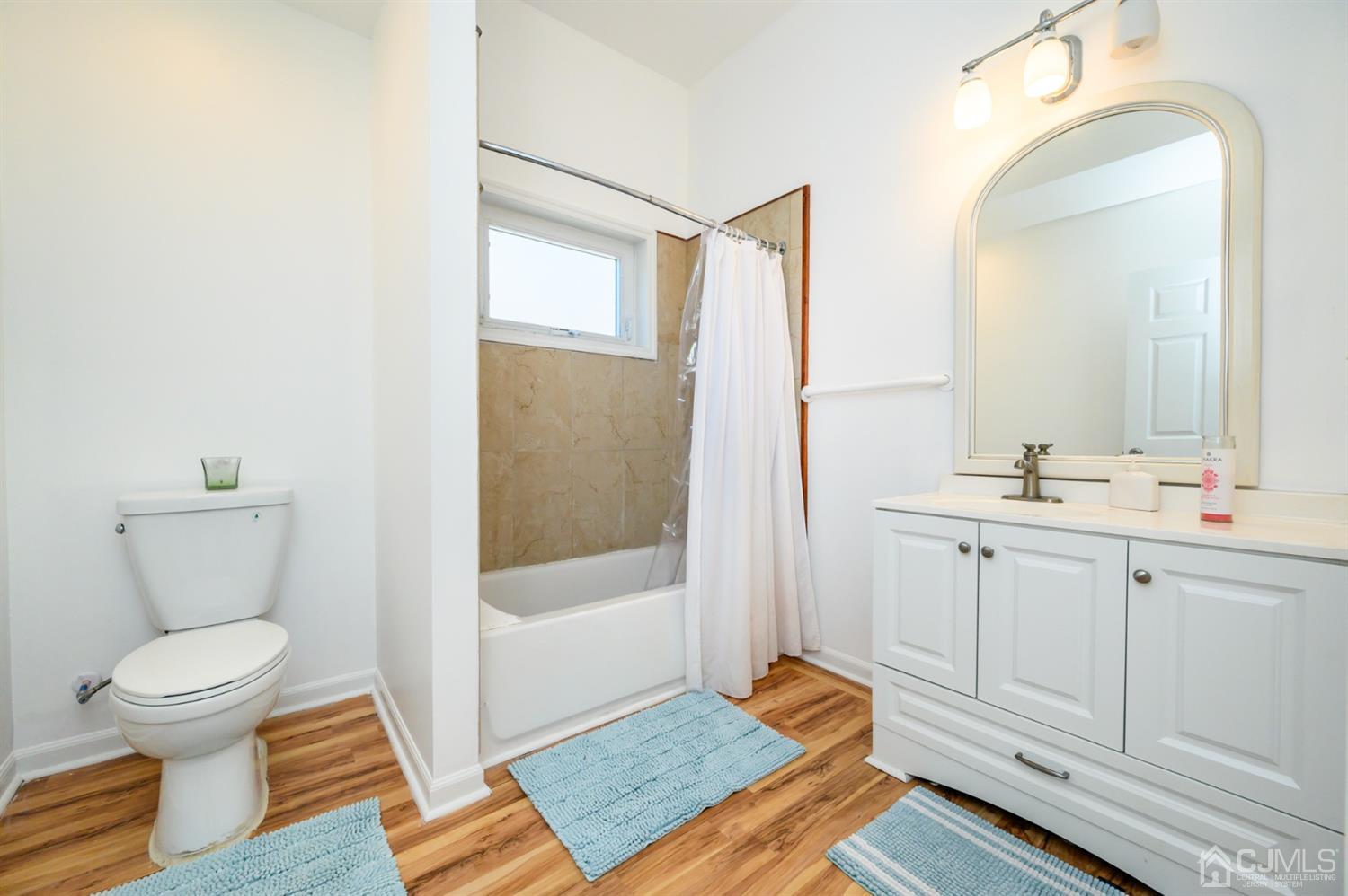 31 Parker Road Long Valley, NJ 07853 - Photo 35 of 46 a bathroom with a sink and a mirror