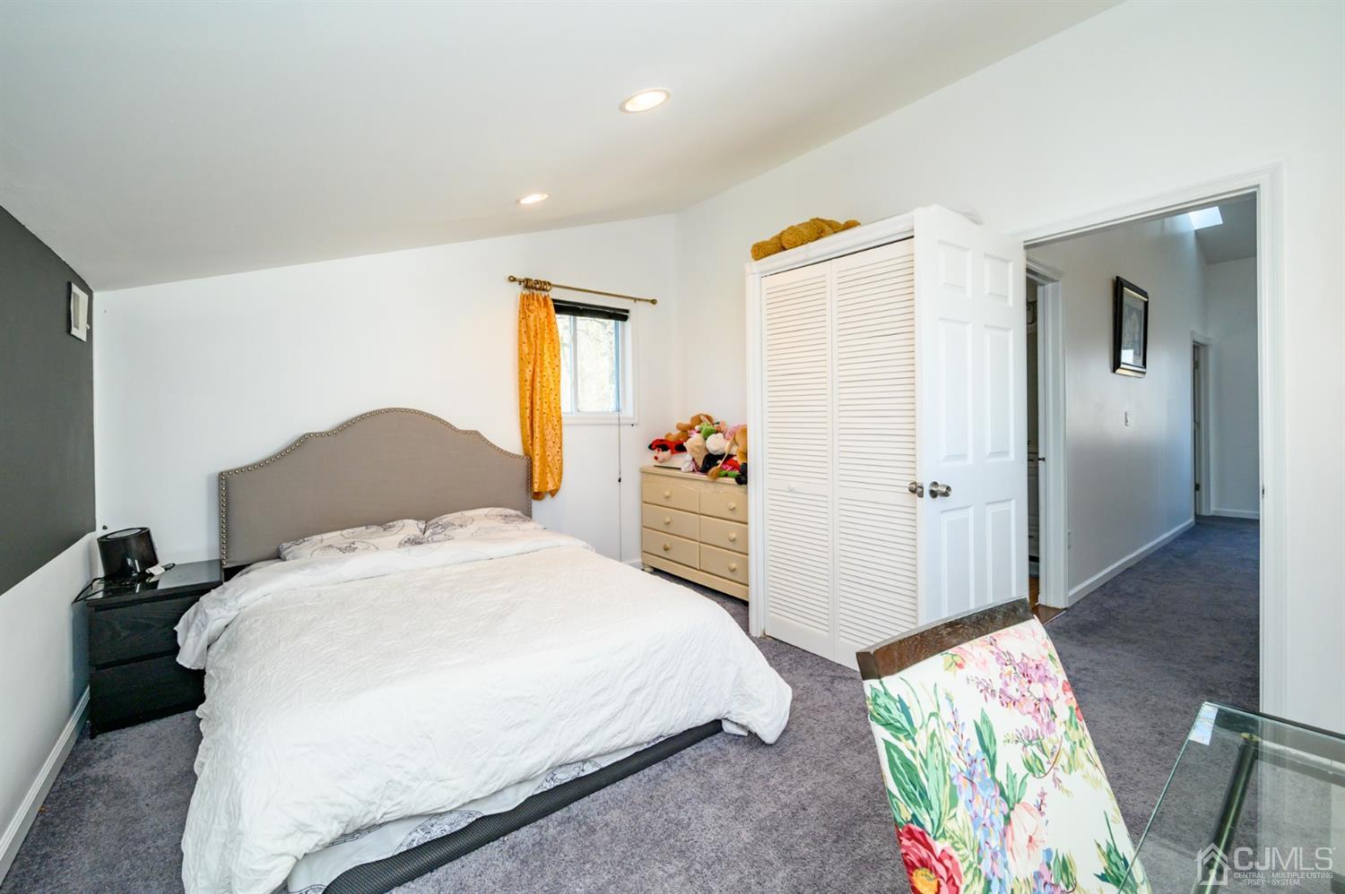 31 Parker Road Long Valley, NJ 07853 - Photo 36 of 46 a bedroom with bed and wooden floor