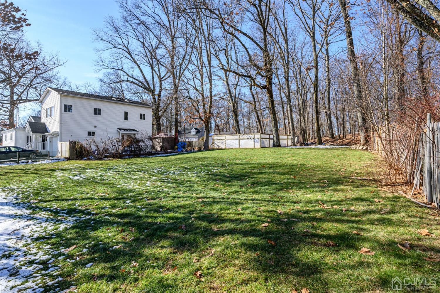 31 Parker Road Long Valley, NJ 07853 - Photo 41 of 46 a view of a big yard with a large tree