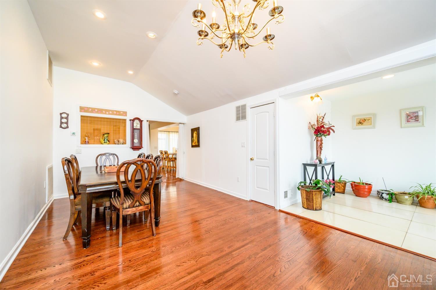 31 Parker Road Long Valley, NJ 07853 - Photo 7 of 46 a view of a dining room with furniture and wooden floor