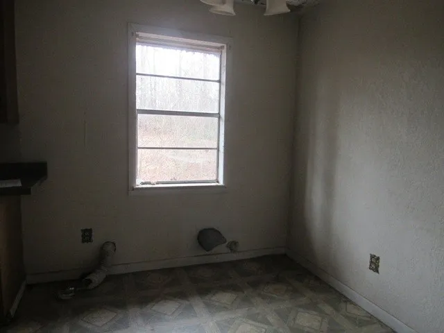 an empty room with a window