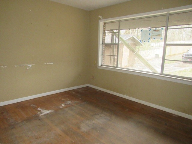 78 Holly Pl Road Marble, NC 28905 - Photo 14 of 27 an empty room with a window