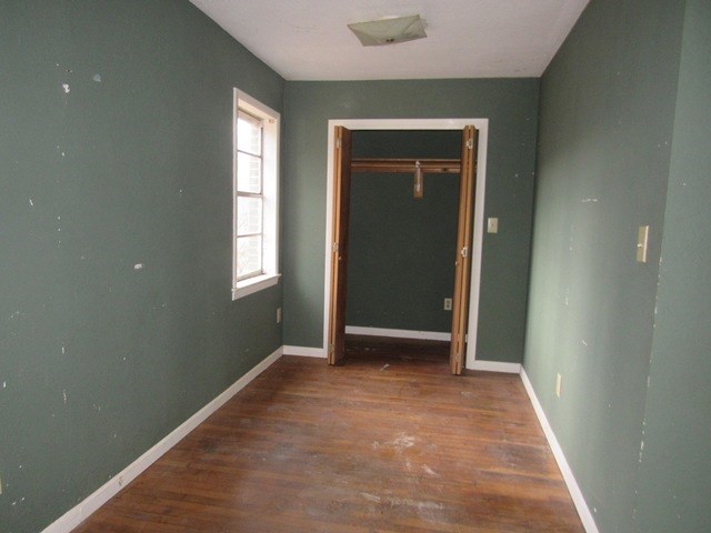 78 Holly Pl Road Marble, NC 28905 - Photo 21 of 27 an empty room with windows and closet