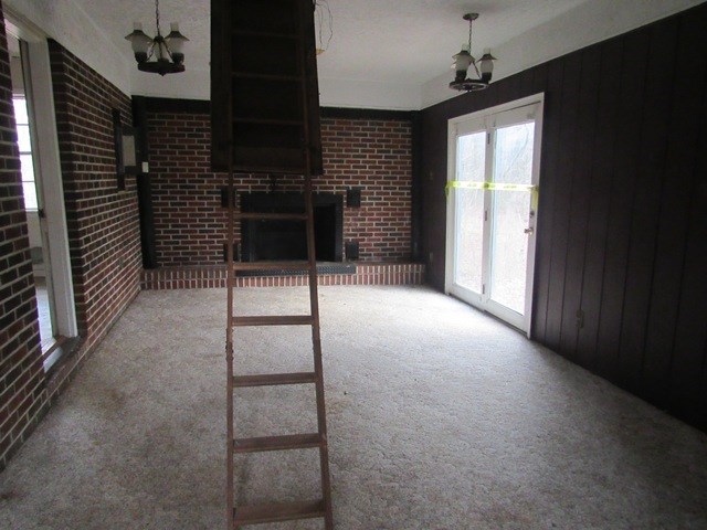 78 Holly Pl Road Marble, NC 28905 - Photo 27 of 27 a view of an empty room with a fireplace