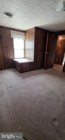 a view of entryway with window and balcony