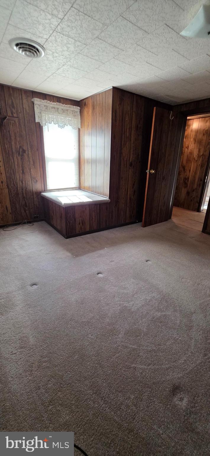 12603 Ellerslie Road Northwest Corriganville, MD 21502 - Photo 17 of 25 an empty room with windows