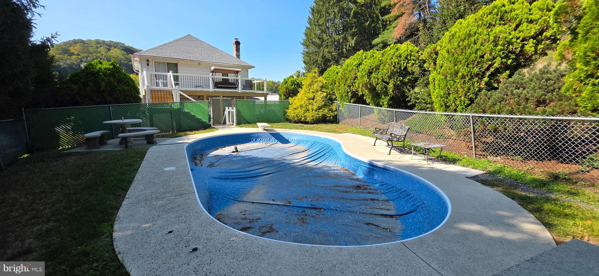 12603 Ellerslie Road Northwest Corriganville, MD 21502 - Photo 4 of 25 a view of a house with a small yard