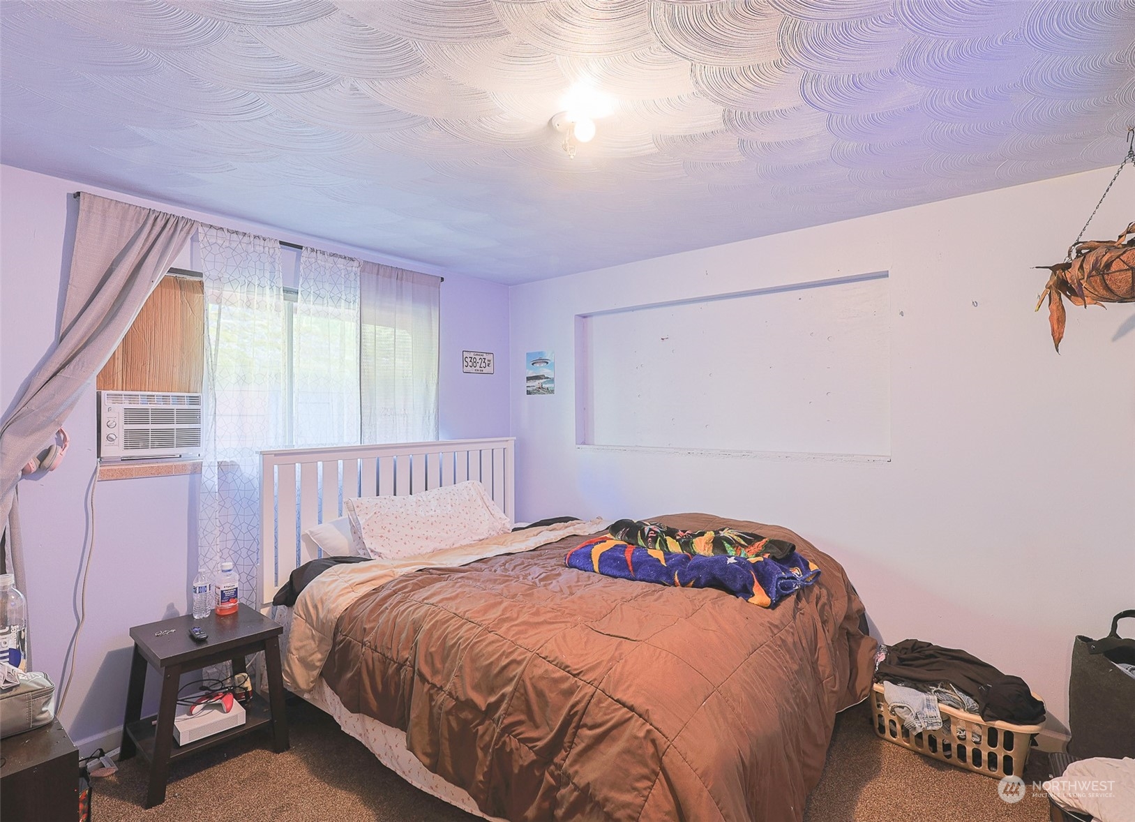 11120 Ohop Valley-Extension Road East Eatonville, WA 98328 - Photo 11 of 32 a bedroom with a bed and a window