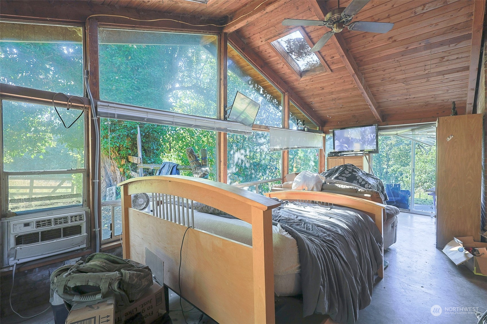 11120 Ohop Valley-Extension Road East Eatonville, WA 98328 - Photo 18 of 32 a bed sitting in a bedroom next to a window