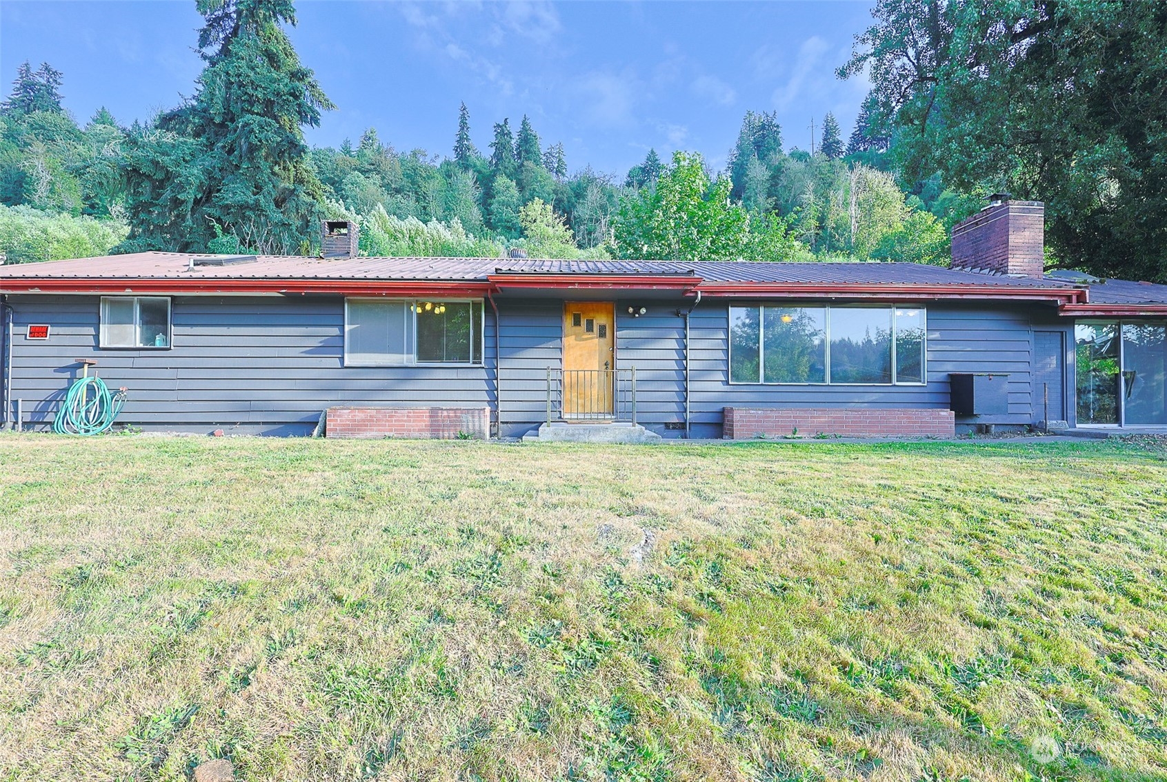 11120 Ohop Valley-Extension Road East Eatonville, WA 98328 - Photo 2 of 32 front view of a house with a yard