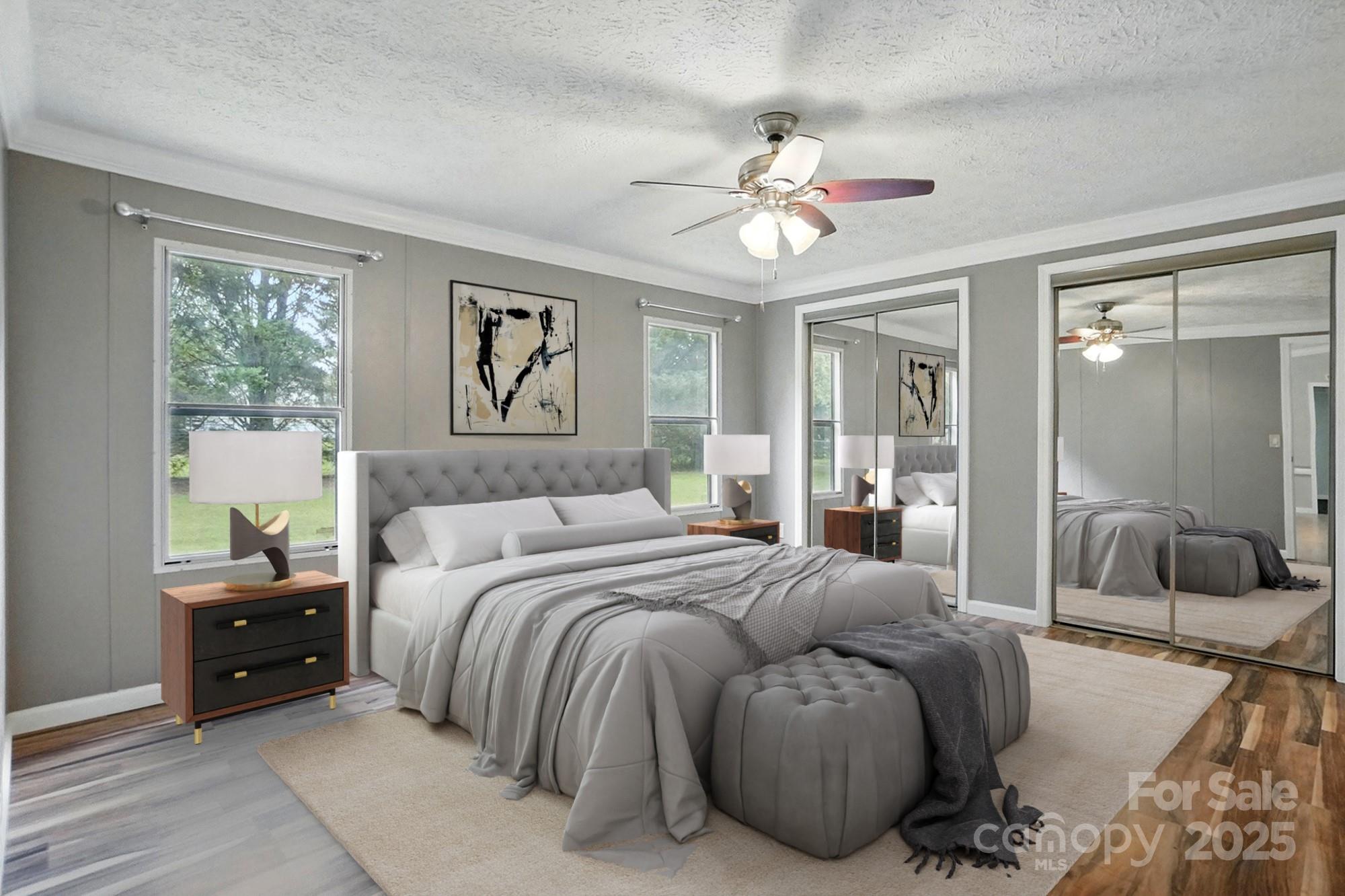 621 Harper Davis Road Lake Wylie, SC 29710 - Photo 13 of 30 a bedroom with a bed and a chandelier