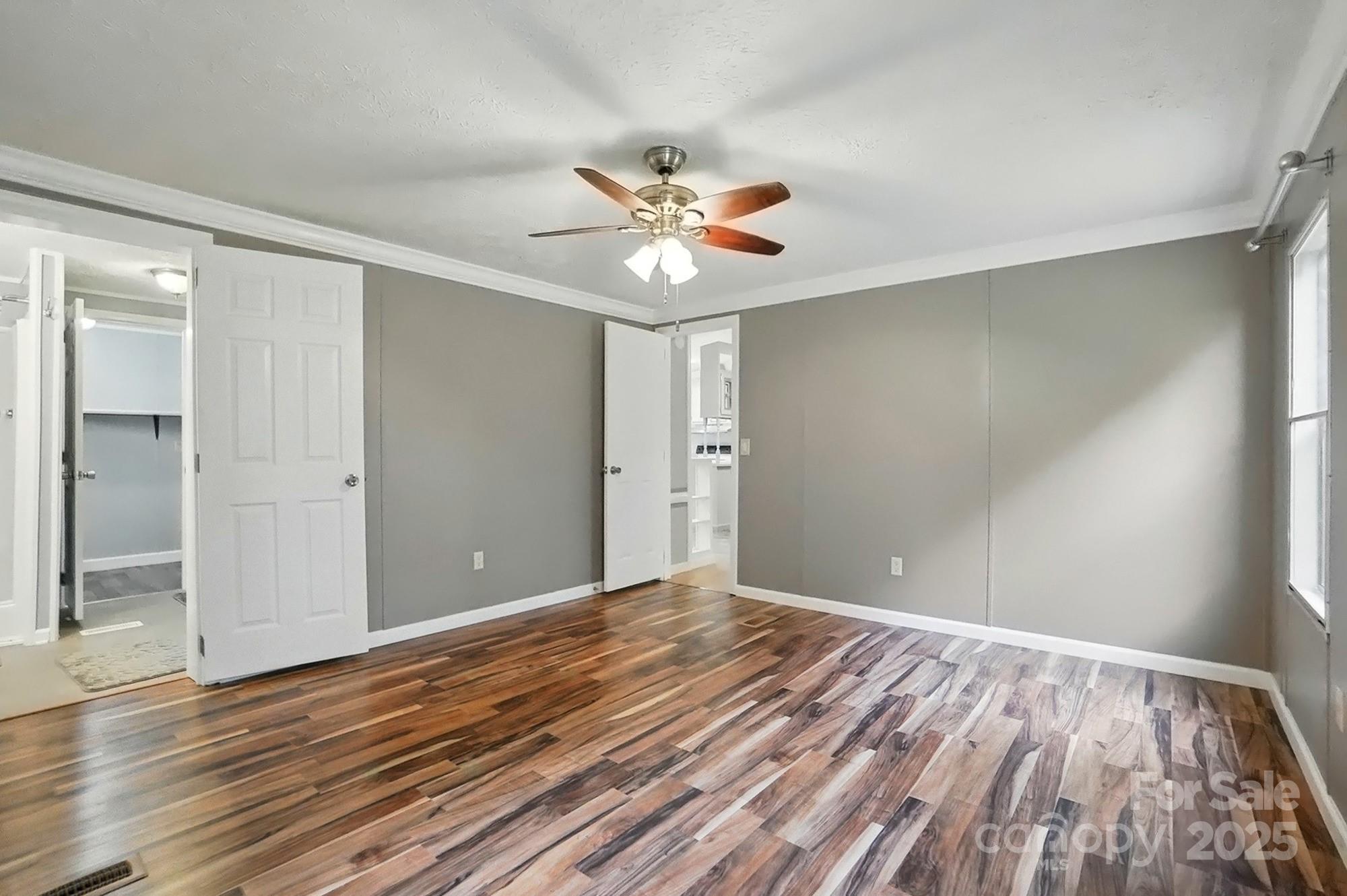 621 Harper Davis Road Lake Wylie, SC 29710 - Photo 15 of 30 wooden floor in an empty room with a window