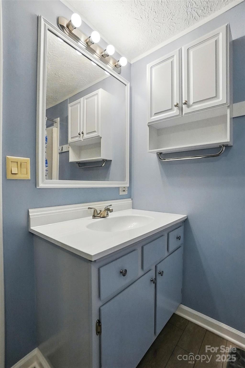 621 Harper Davis Road Lake Wylie, SC 29710 - Photo 18 of 30 a bathroom with a sink and a mirror