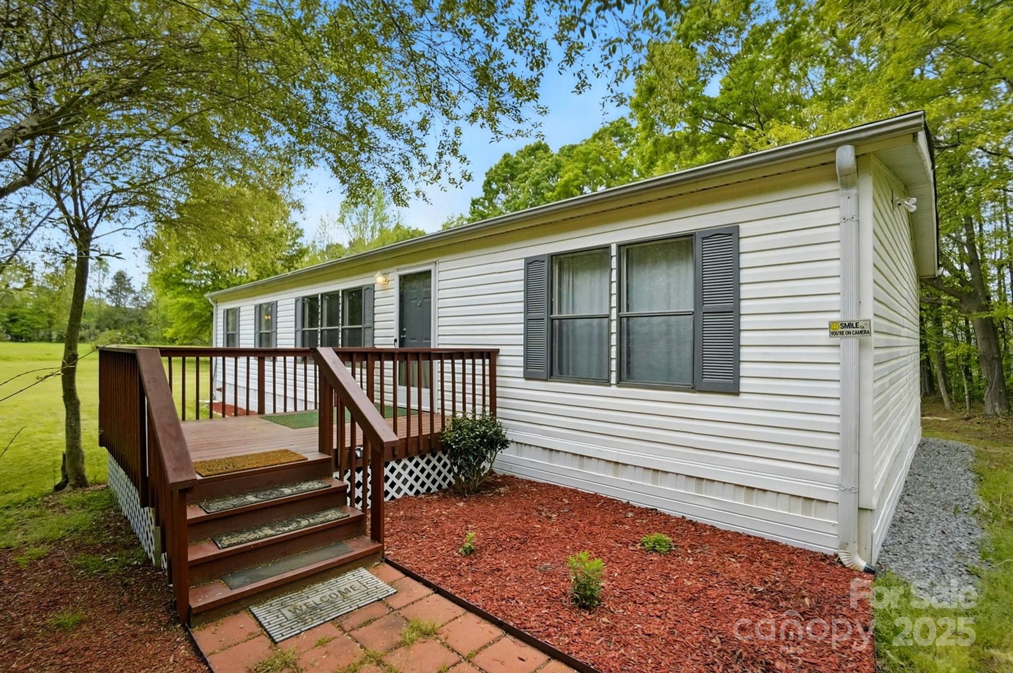 621 Harper Davis Road Lake Wylie, SC 29710 - Photo 2 of 30 a view of a two chairs in the deck