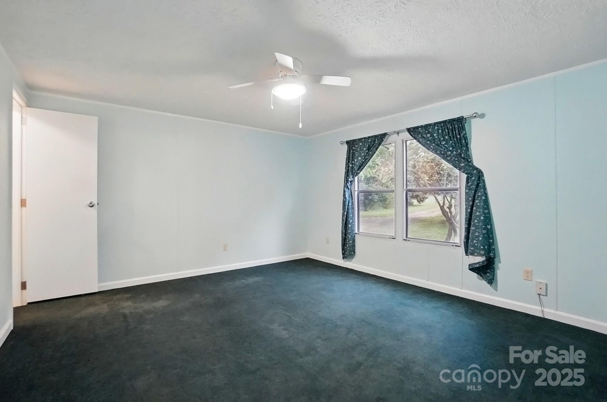 621 Harper Davis Road Lake Wylie, SC 29710 - Photo 23 of 30 an empty room with a window