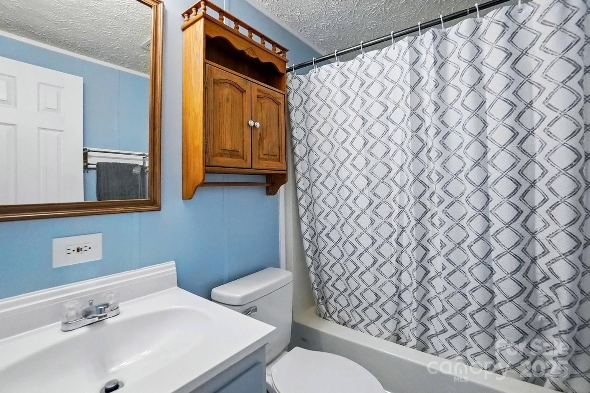 621 Harper Davis Road Lake Wylie, SC 29710 - Photo 24 of 30 a bathroom with a sink and a toilet