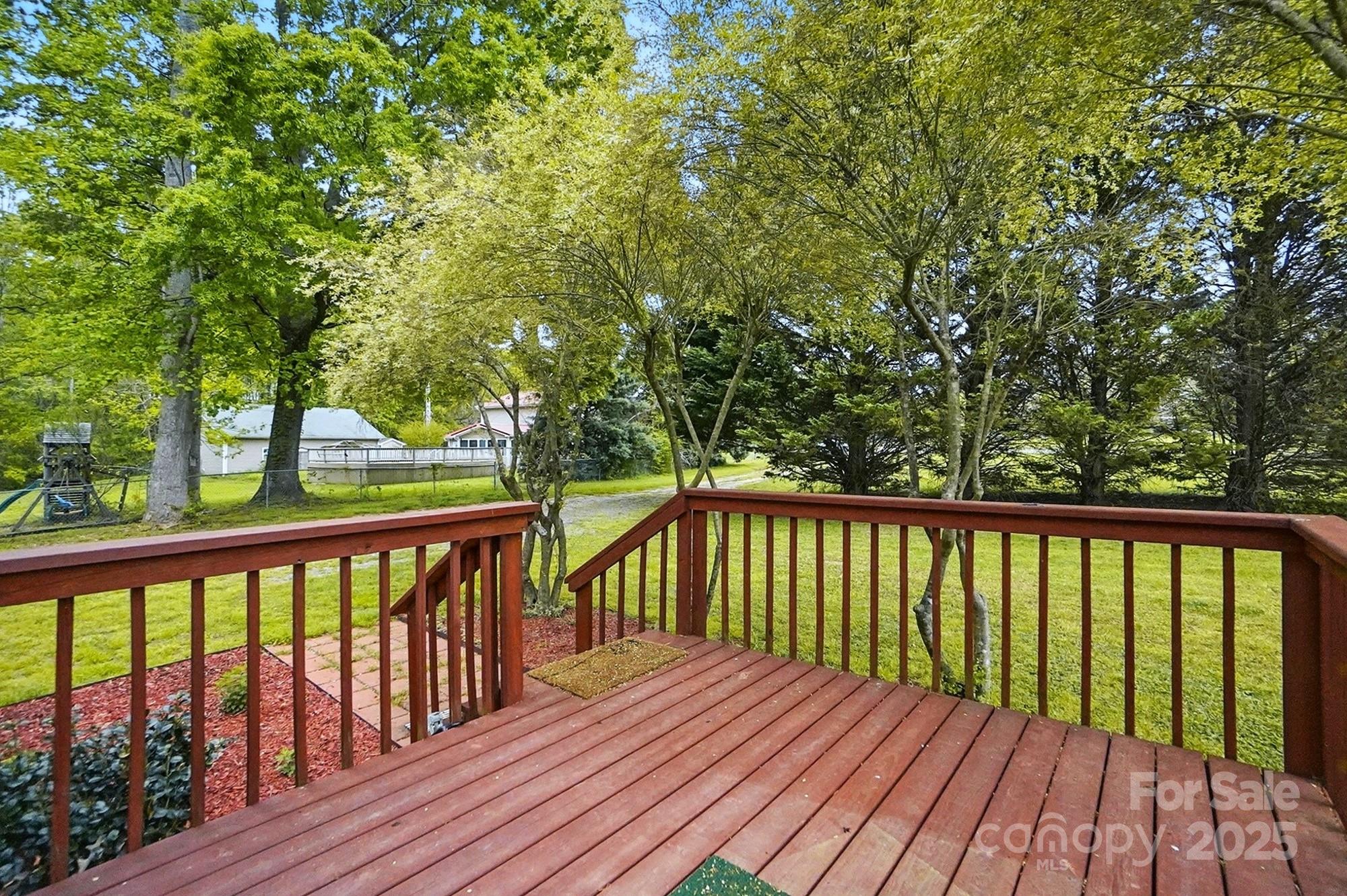 621 Harper Davis Road Lake Wylie, SC 29710 - Photo 25 of 30 a view of balcony with wooden floor and fence