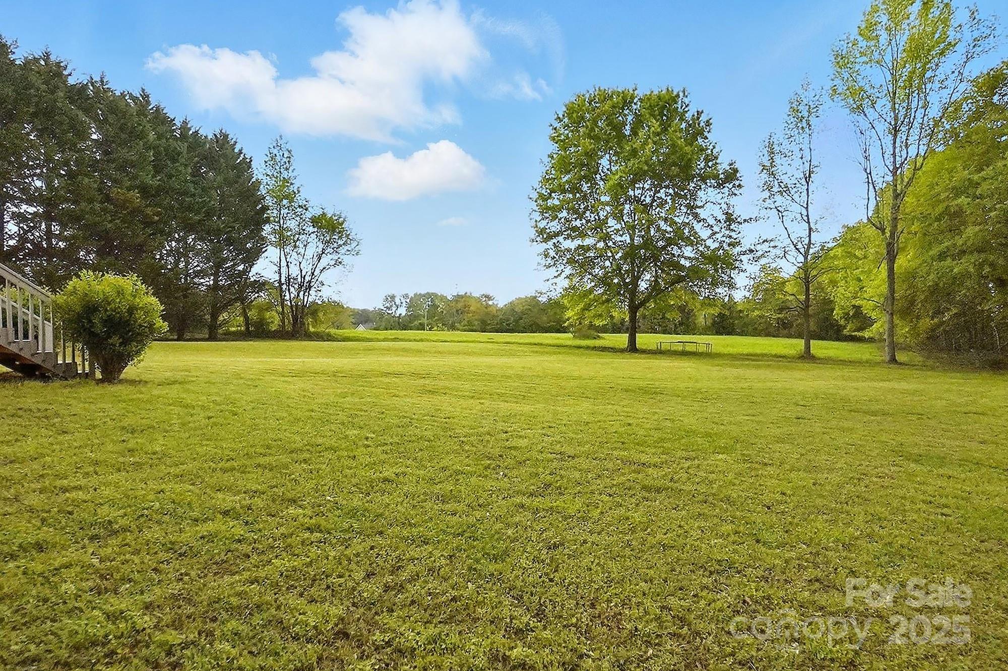 621 Harper Davis Road Lake Wylie, SC 29710 - Photo 27 of 30 a view of an ocean with a trees in the background