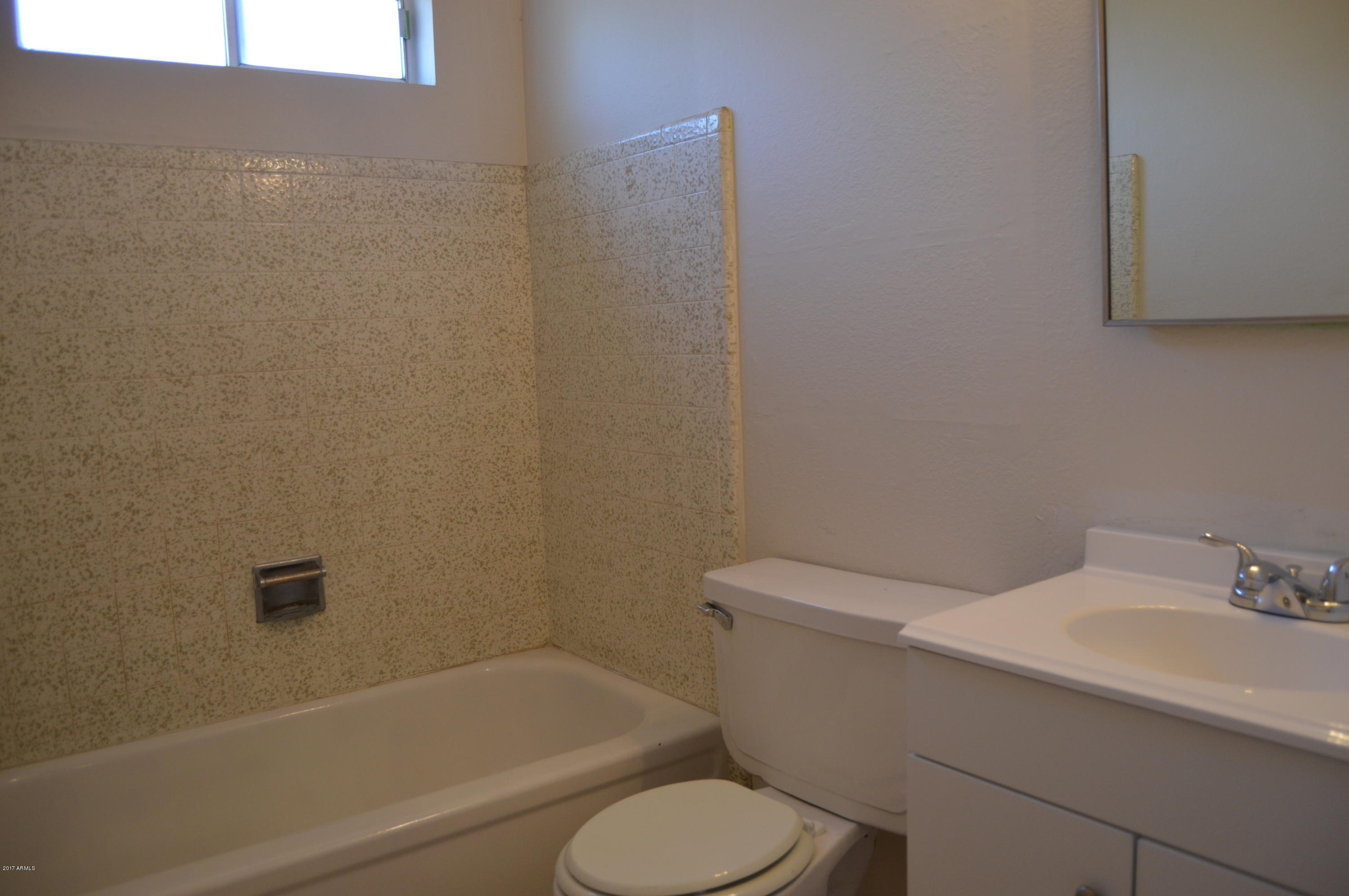223 West Harwell Rd. Phoenix, AZ 85041 - Photo 16 of 23 Hall Bathroom