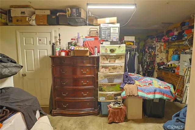 a bed room with a bed and a window