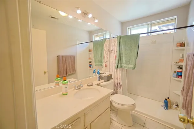 a bedroom with toys and a baby crib
