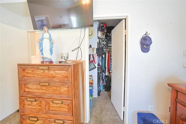 a bathroom with a shower sink and mirror