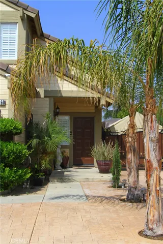 a front view of a building with garden