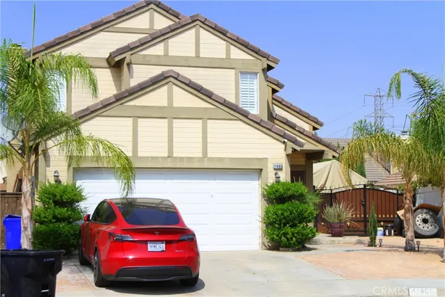 a front view of a house with yard