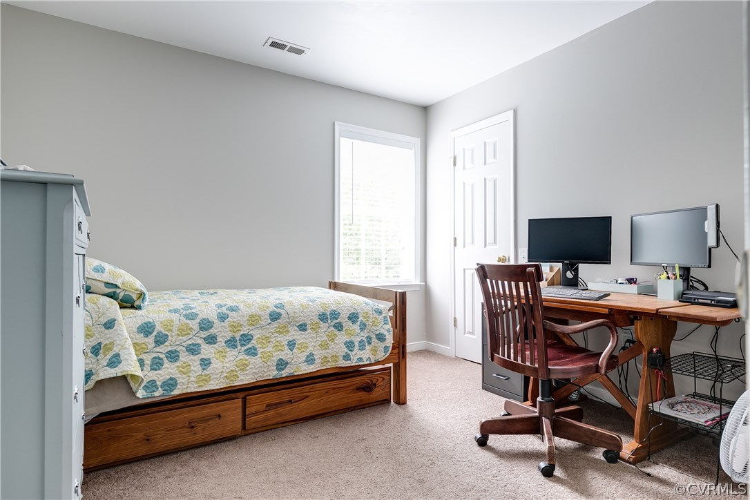 10970 Weybridge Road Chester, VA 23831 - Photo 17 of 35 a view of a bedroom with workspace and bedroom