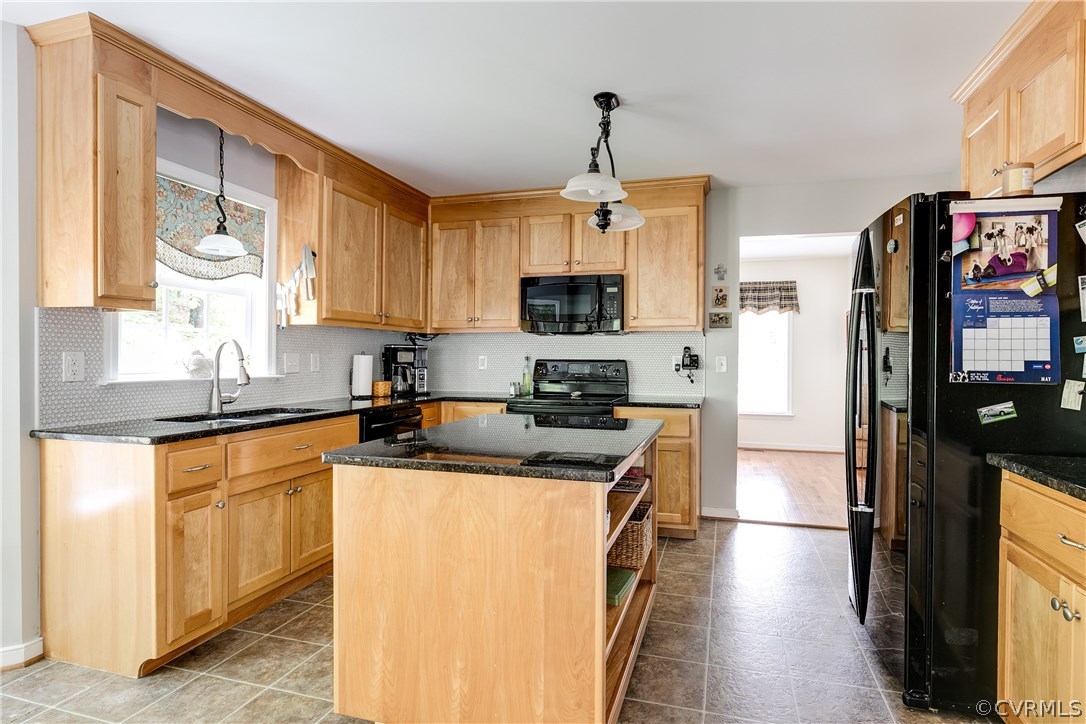 10970 Weybridge Road Chester, VA 23831 - Photo 23 of 35 a kitchen with stainless steel appliances granite countertop a refrigerator a stove a sink dishwasher and white cabinets with wooden floor
