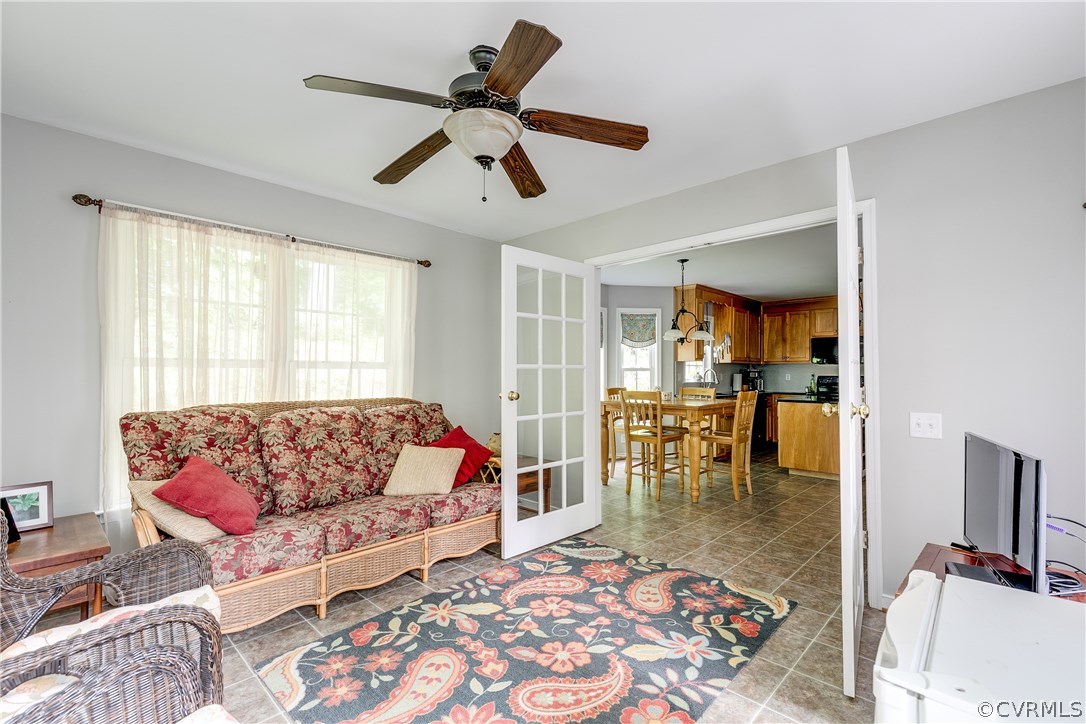 10970 Weybridge Road Chester, VA 23831 - Photo 26 of 35 a living room with furniture and a large window