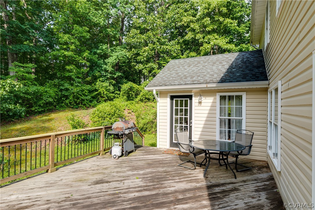 10970 Weybridge Road Chester, VA 23831 - Photo 30 of 35 a view of a house with backyard and sitting area