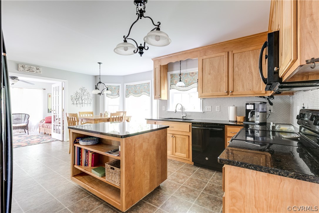 10970 Weybridge Road Chester, VA 23831 - Photo 3 of 35 a kitchen with stainless steel appliances granite countertop a stove and a sink