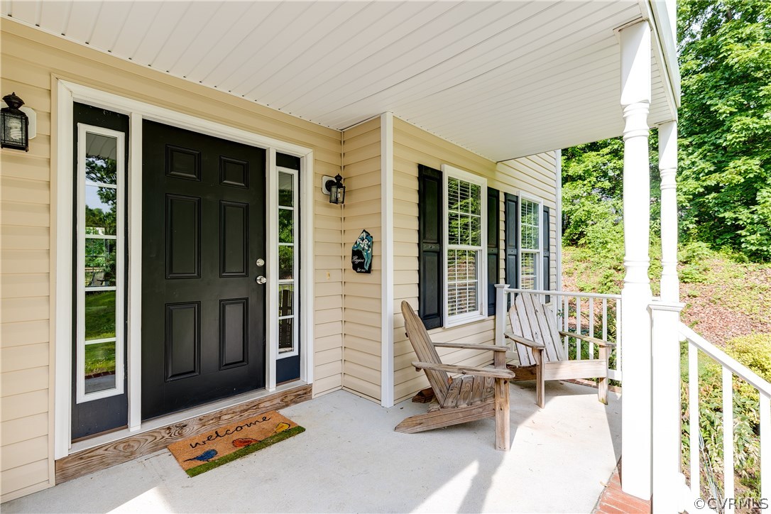 10970 Weybridge Road Chester, VA 23831 - Photo 33 of 35 a view of a bedroom with balcony and large windows