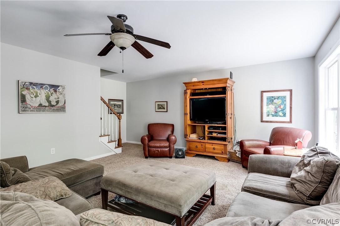 10970 Weybridge Road Chester, VA 23831 - Photo 5 of 35 a living room with furniture and a flat screen tv