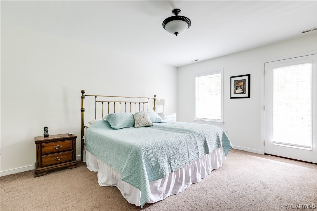 10970 Weybridge Road Chester, VA 23831 - Photo 6 of 35 a bedroom with a bed and a window