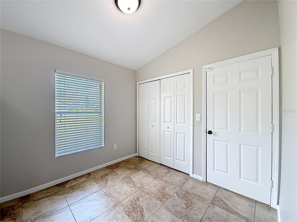 6358 Southwest 155th Place Ocala, FL 34473 - Photo 14 of 55 a view of an empty room with closet area