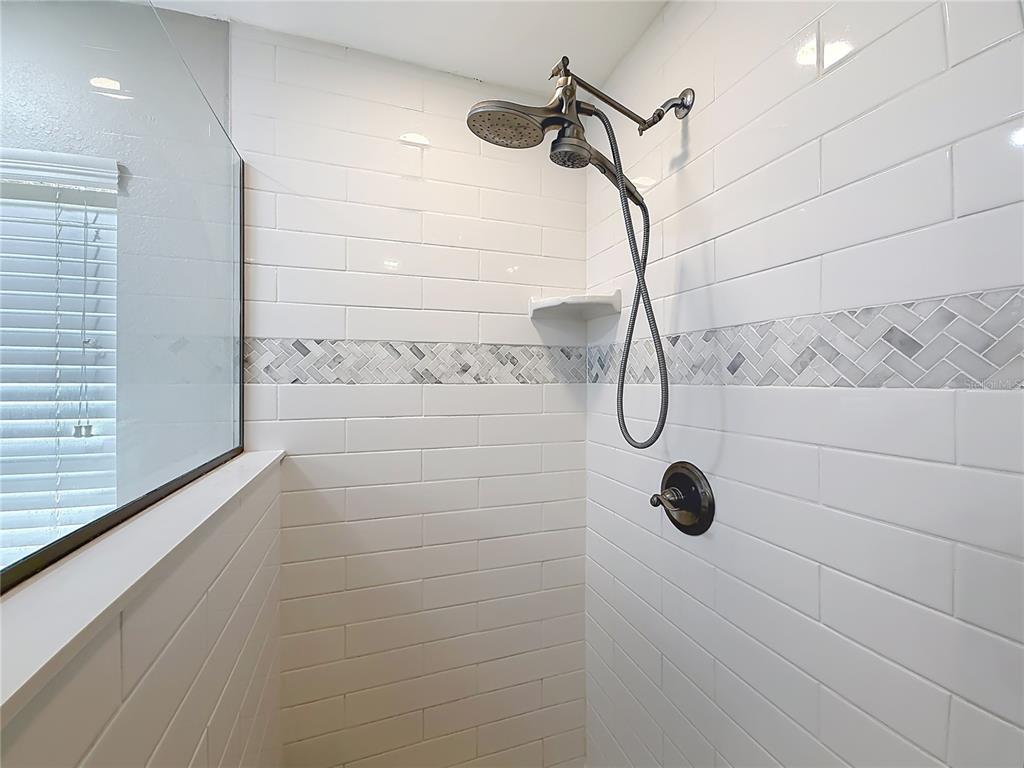 6358 Southwest 155th Place Ocala, FL 34473 - Photo 41 of 55 a bathroom with a shower