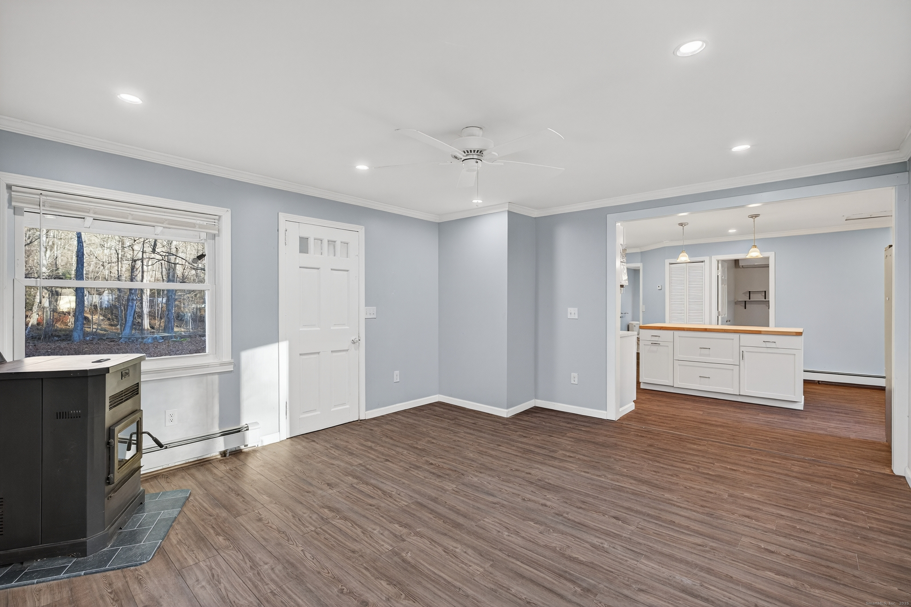 586 Back Road Windham, CT 06256 - Photo 13 of 32 a view of empty room with wooden floor and window